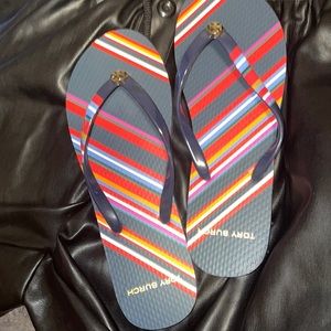 Brand new TB flip flops
